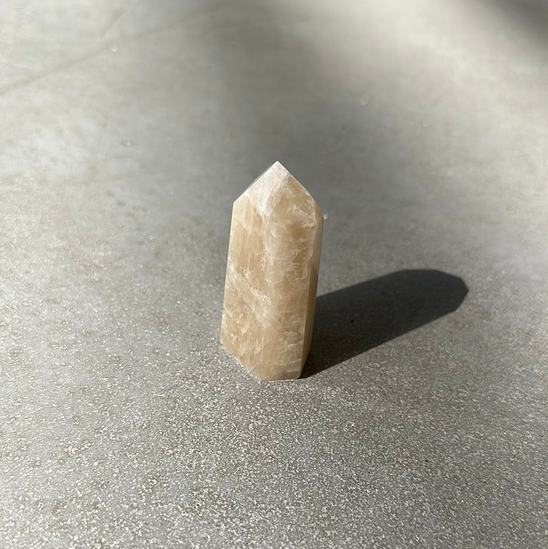 Citrine tower crystal, 2.68 oz, known for energizing life and attracting wealth and success.