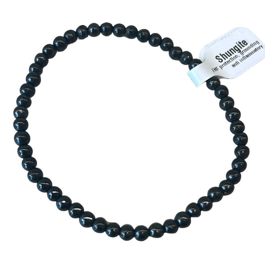 Shungite bead bracelet 4MM offering antioxidant benefits and EMF protection, shown in a circular arrangement with label tag.