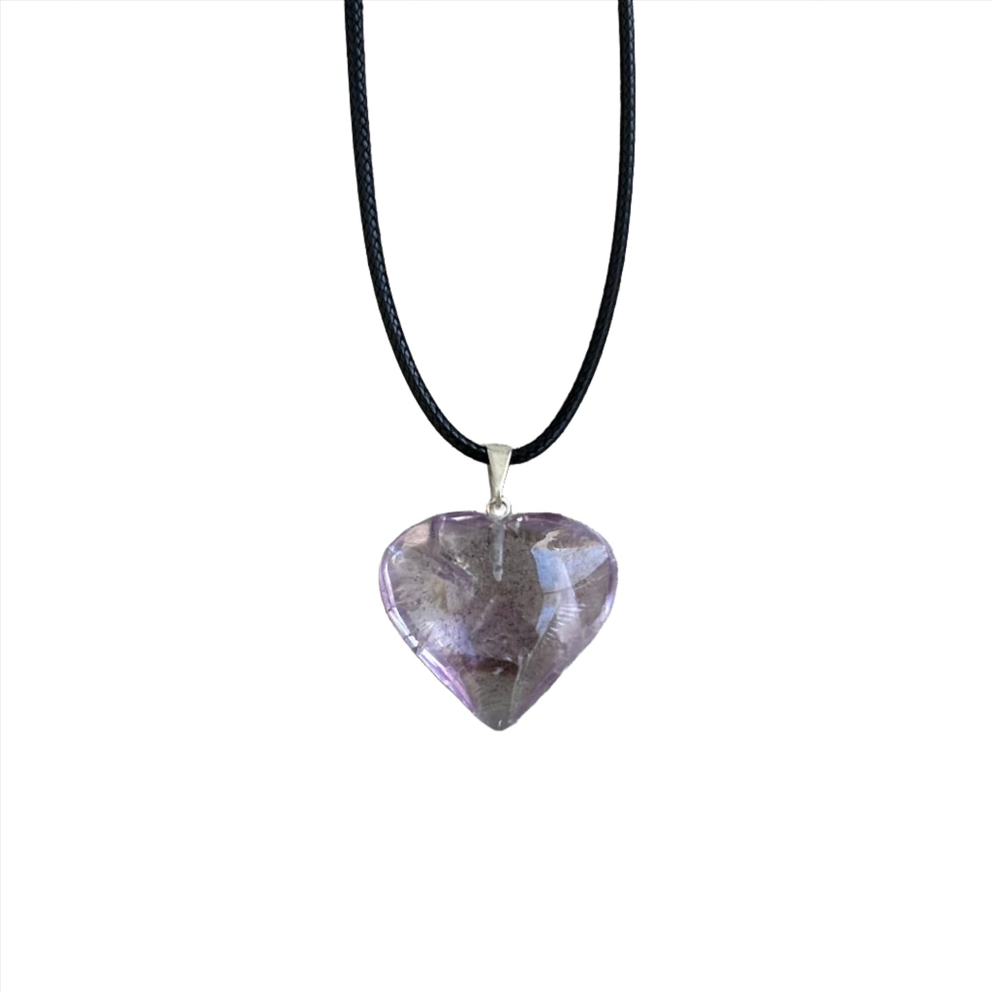 Amethyst heart pendant necklace on a black cord, featuring healing crystals for stress relief and mood stabilization.