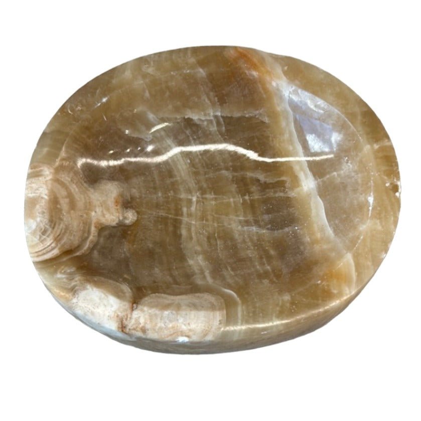Honey Calcite bowl, a stone known for boosting confidence and enhancing intuition, promoting positive energy and success.