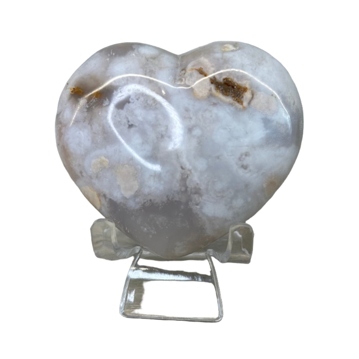 Flower Agate Heart 218g with light pink hues on a stand, promoting relaxation and healing properties.