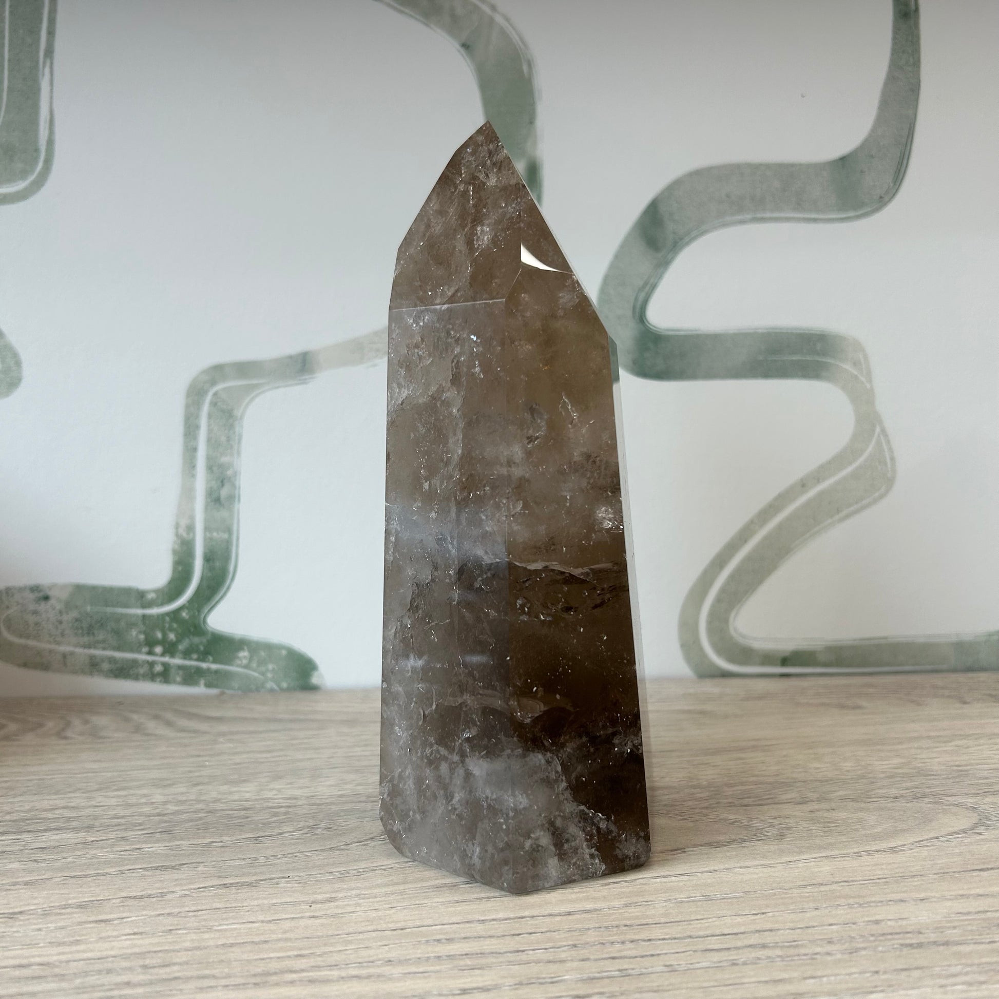 Smoky Quartz tower crystal, 1343g, known for grounding, purifying energies, and promoting emotional stability.