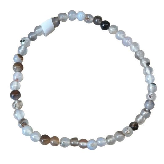 Black and white agate bracelet with 4mm beads, promoting balance and harmony, cleanses aura, and supports healing and wellbeing.