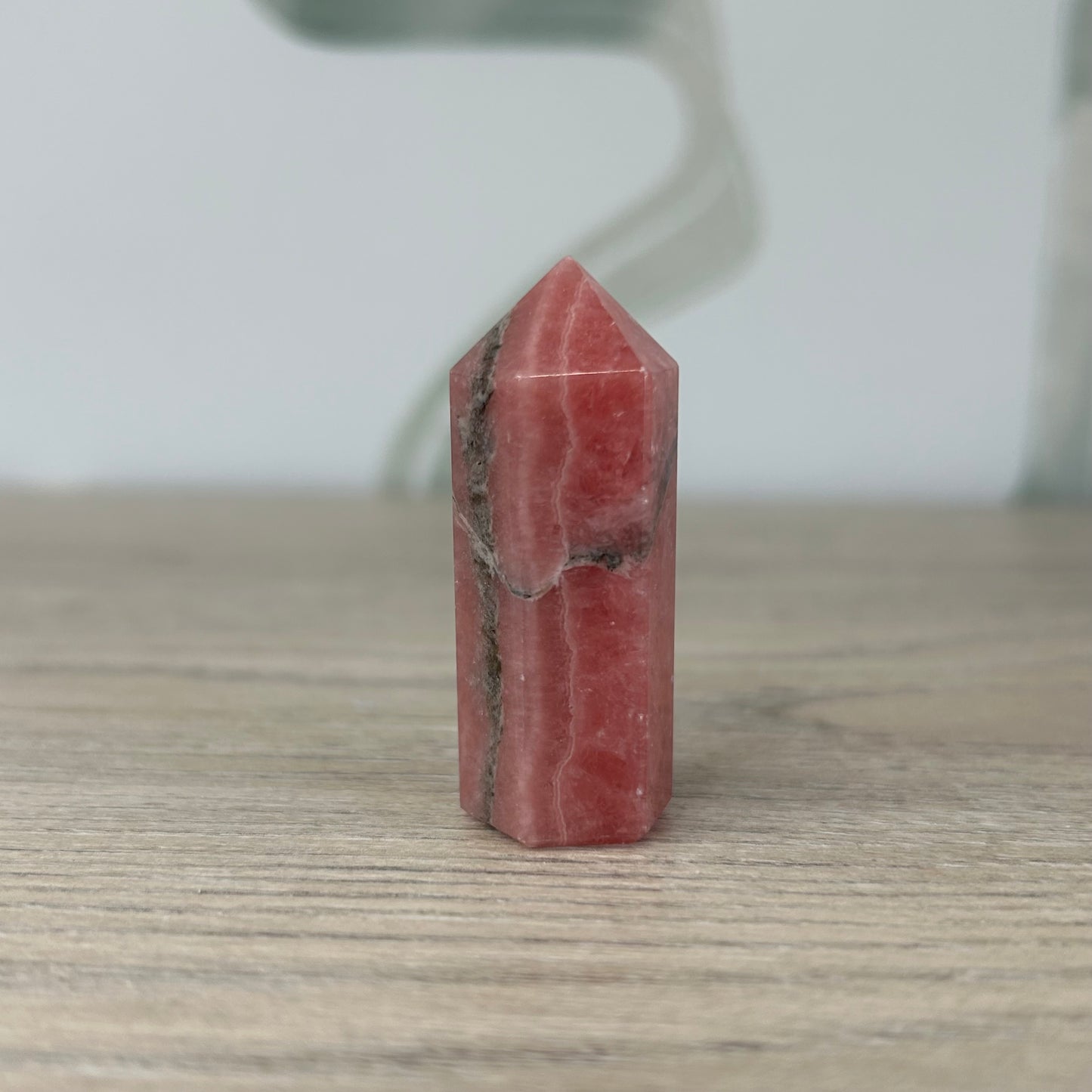 Rhodochrosite tower 37g, enhances positivity, emotional healing, and supports heart and respiratory health.