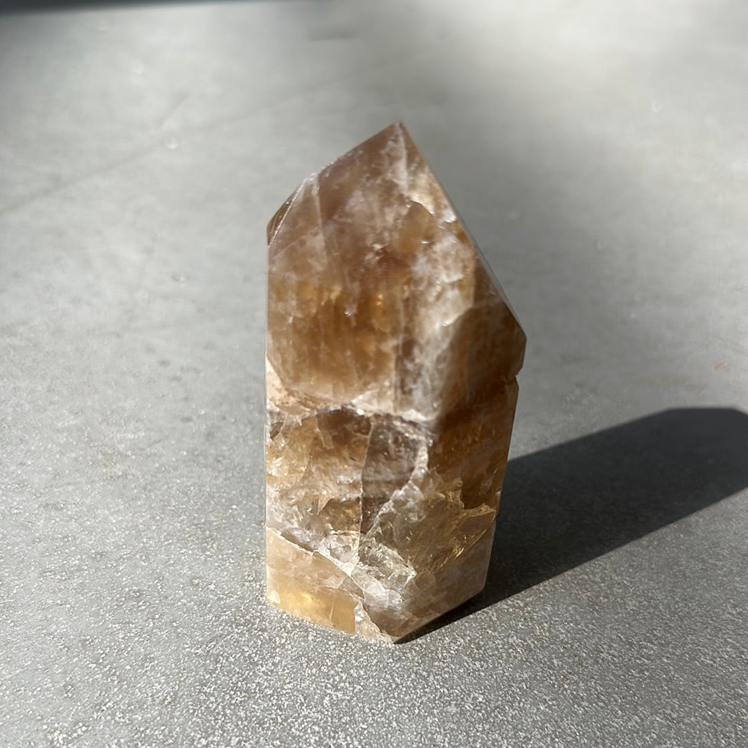 Citrine tower crystal, 10.56 oz, known for energizing life and attracting wealth and success.
