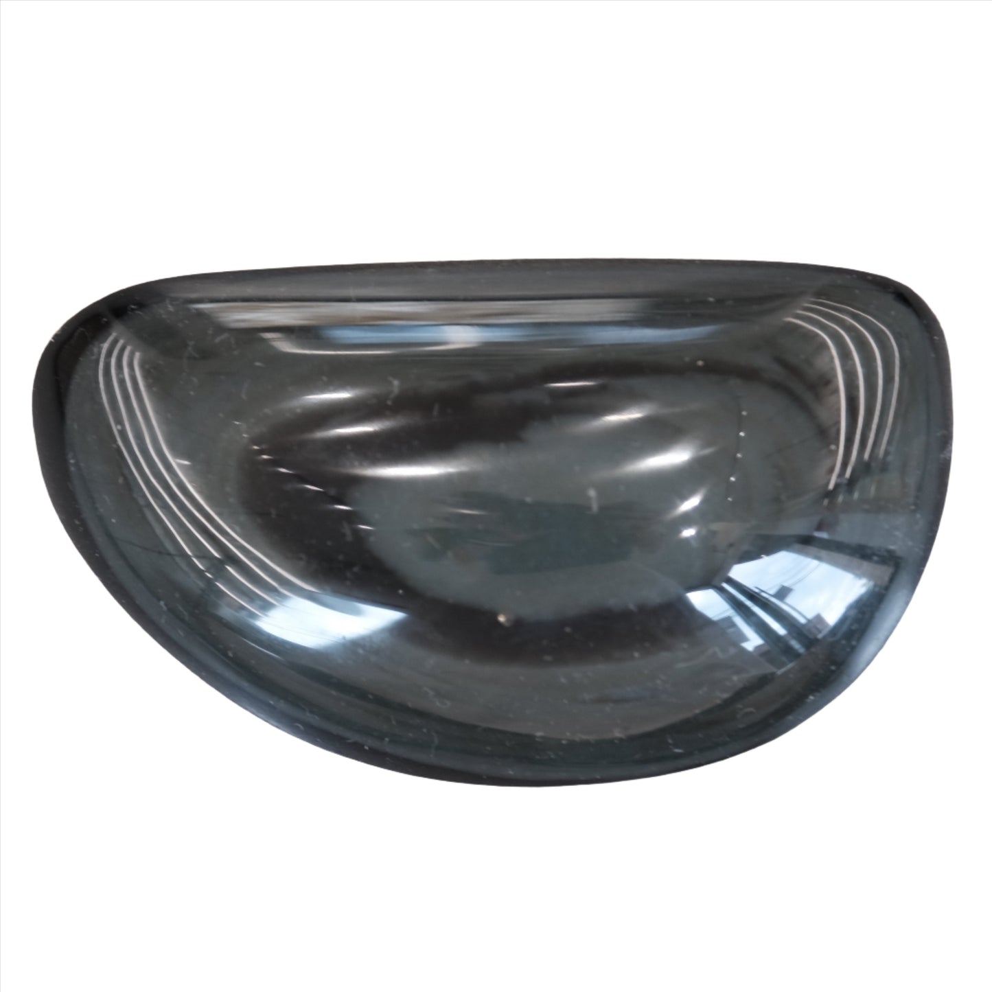 Smooth, glossy rainbow obsidian palmstone with a gentle curve, showcasing its unique reflective qualities.