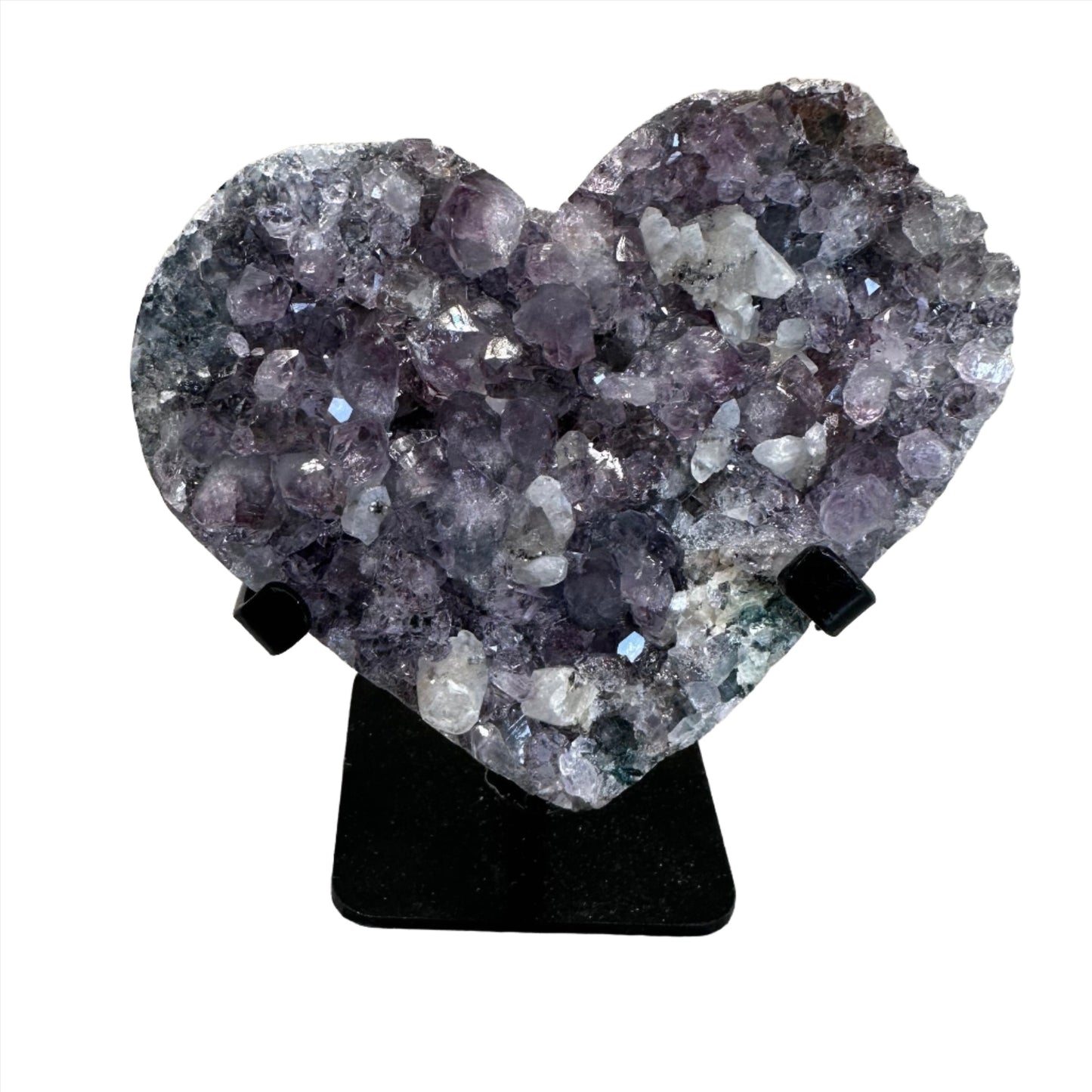 Amethyst heart healing crystal on stand, promotes stress relief, mood stability, and enhanced spiritual clarity.