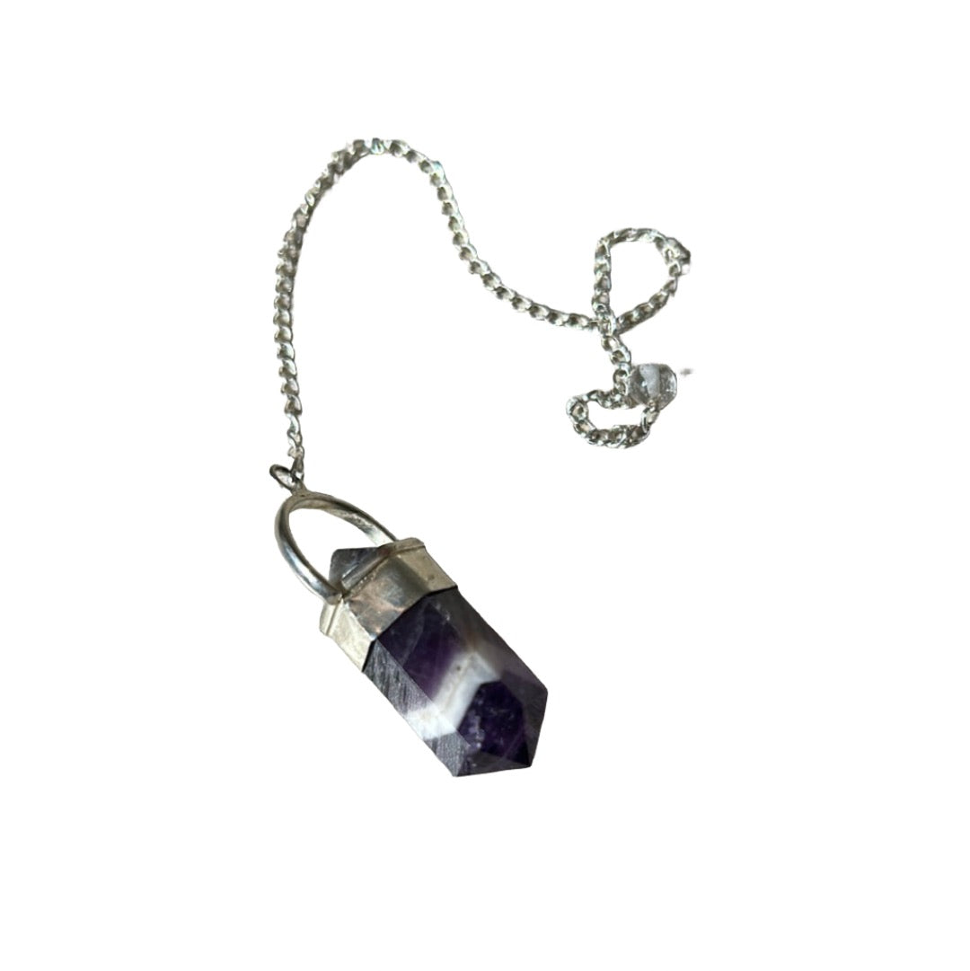 Chevron amethyst pendulum with distinctive purple and white pattern, known for promoting calmness and relaxation.