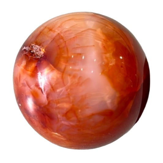 Carnelian sphere weighing 338g, known for boosting creativity, vitality, and promoting positive life choices.