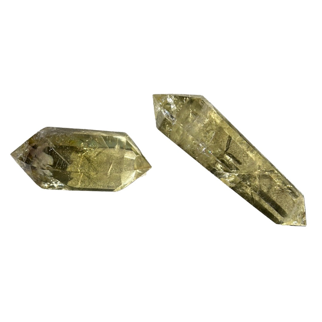 Citrine double terminated points showcasing their vibrant yellow color and natural crystal formation. Ideal for enhancing intuition and prosperity.