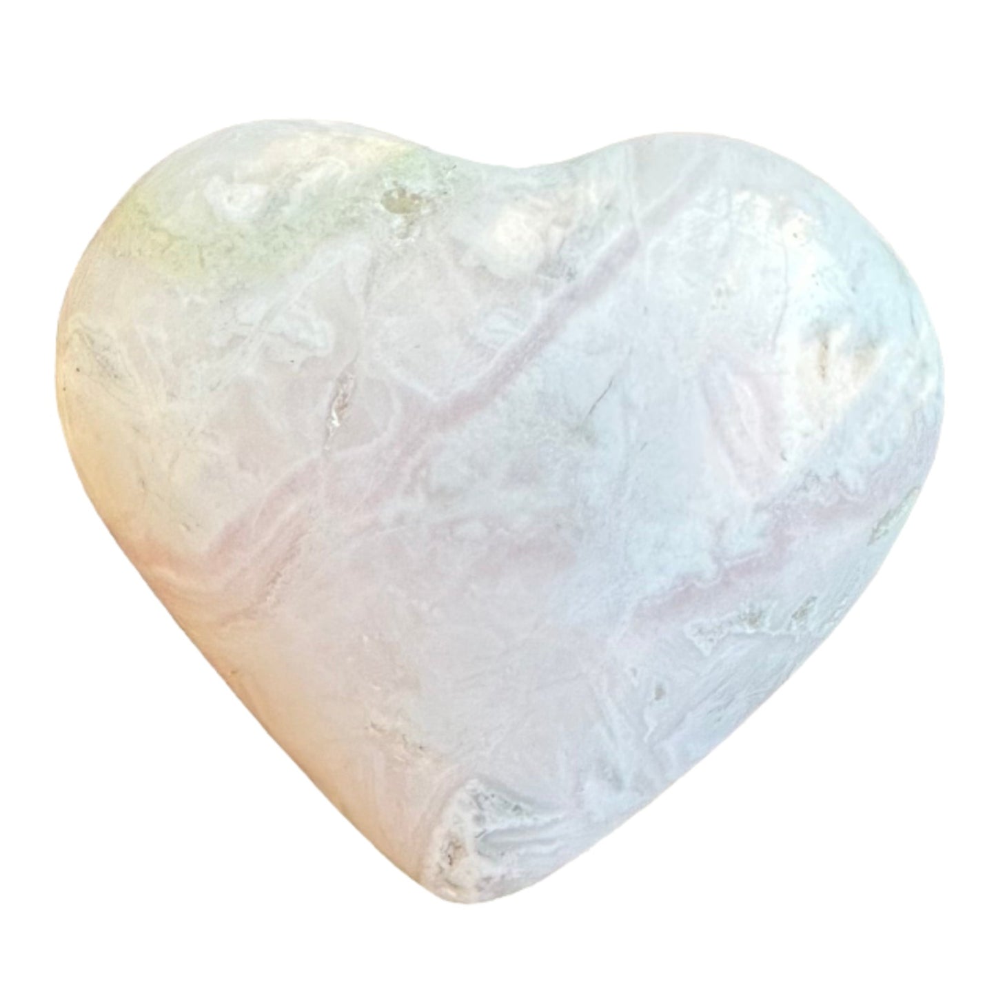 Heart-shaped Mangano Calcite stone, featuring a soft pink hue, known for its soothing energy and healing properties.