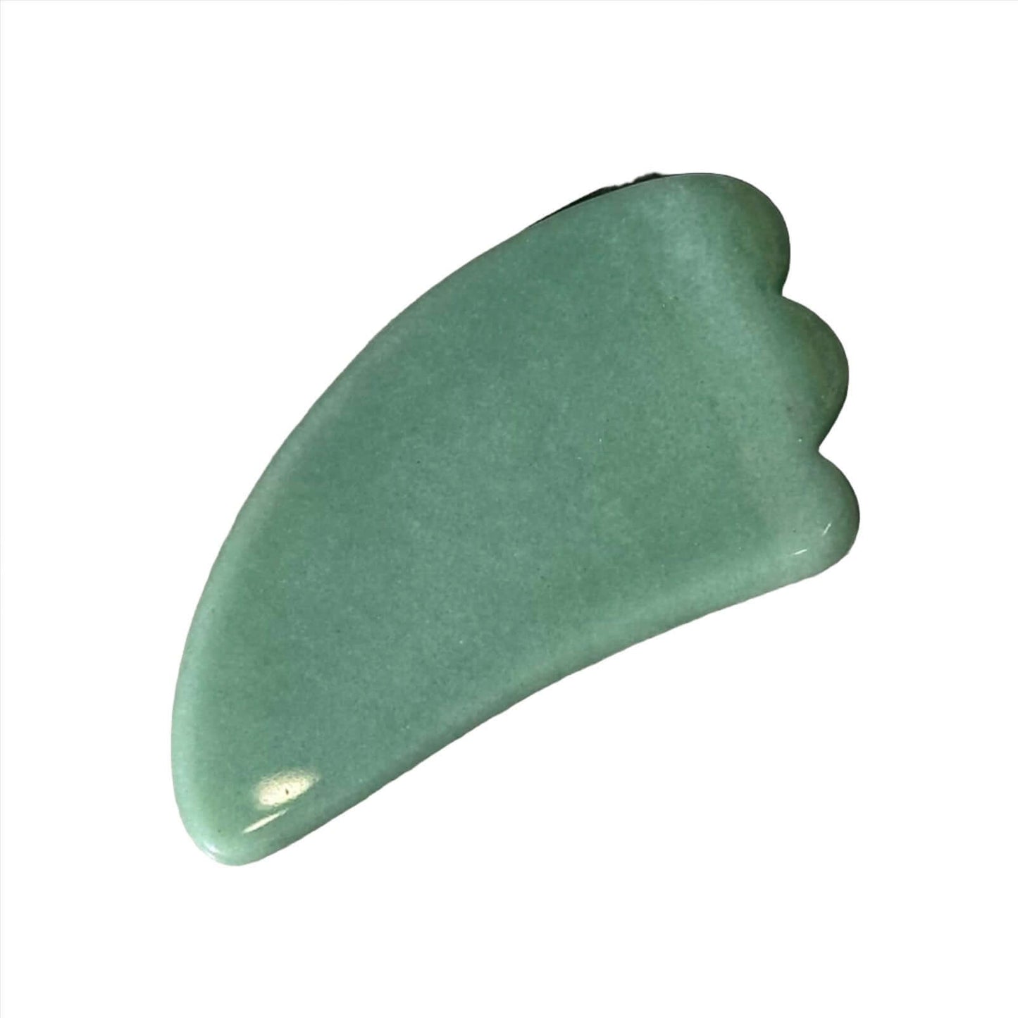 Green Aventurine Gua Sha massager for gentle healing and promoting compassion. Ideal for skincare and wellness routines.