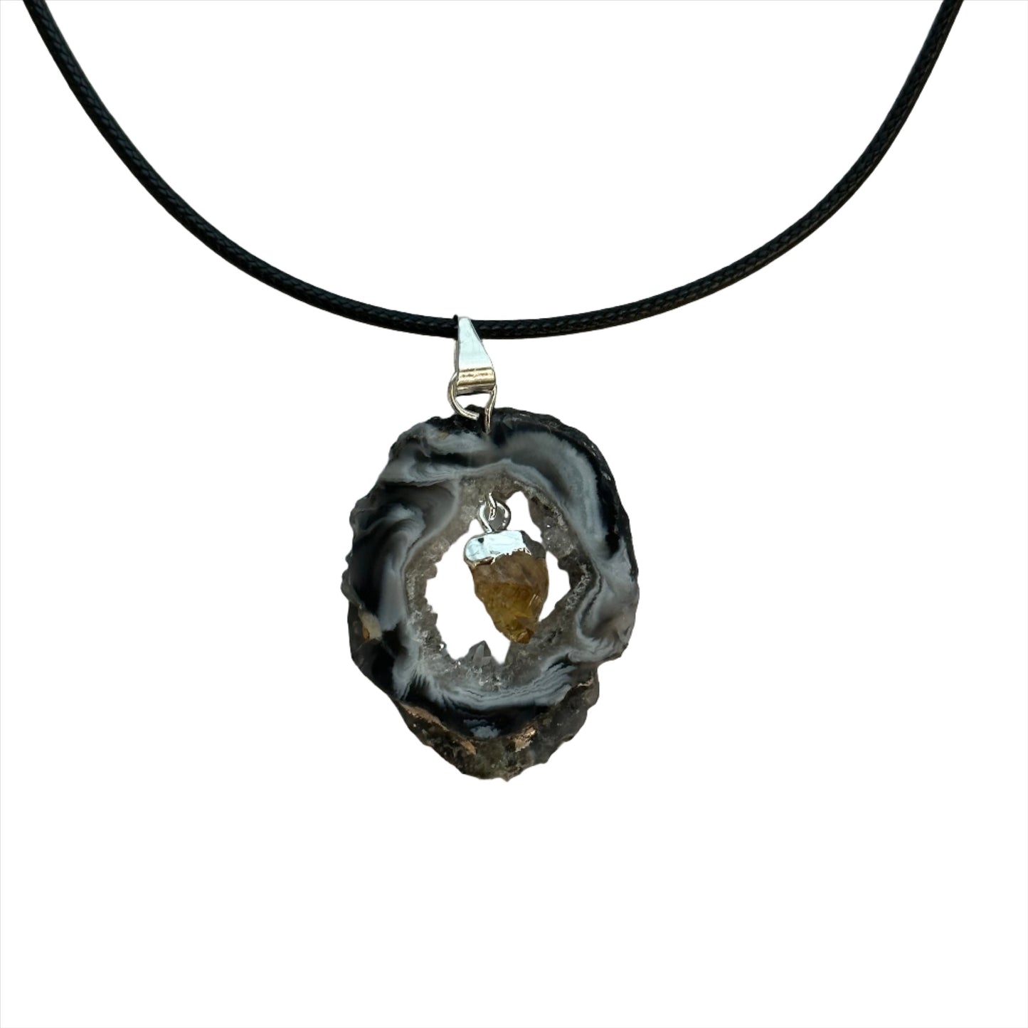 Agate slice pendant necklace with citrine, featuring harmonizing and cleansing properties for aura and spirit balance.