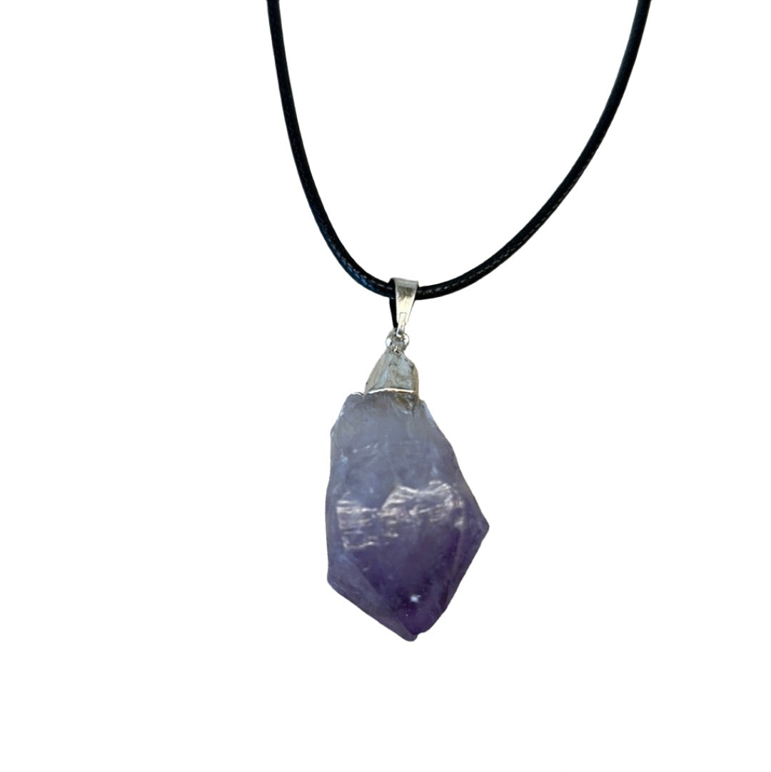 Amethyst point pendant necklace with healing crystals for stress relief and spiritual openness.