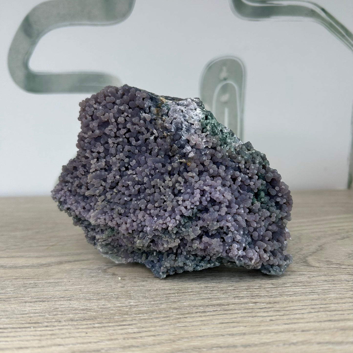 Grape Agate Free Form 412g cluster on wooden table for healing and meditation practices.