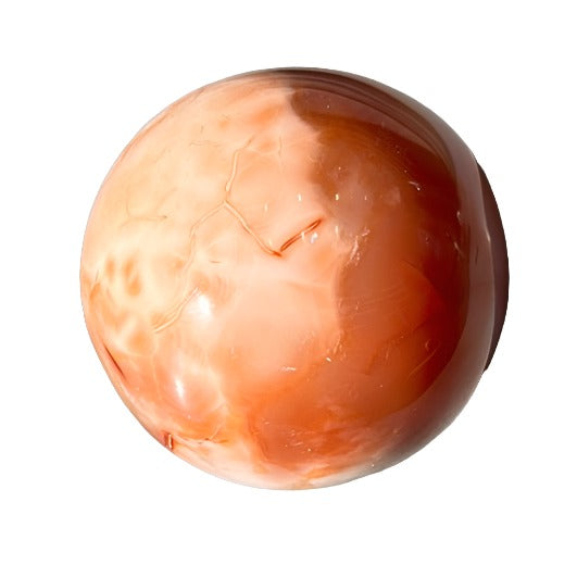 Carnelian sphere 470g, promoting vitality, creativity, and healing for physical and emotional well-being.