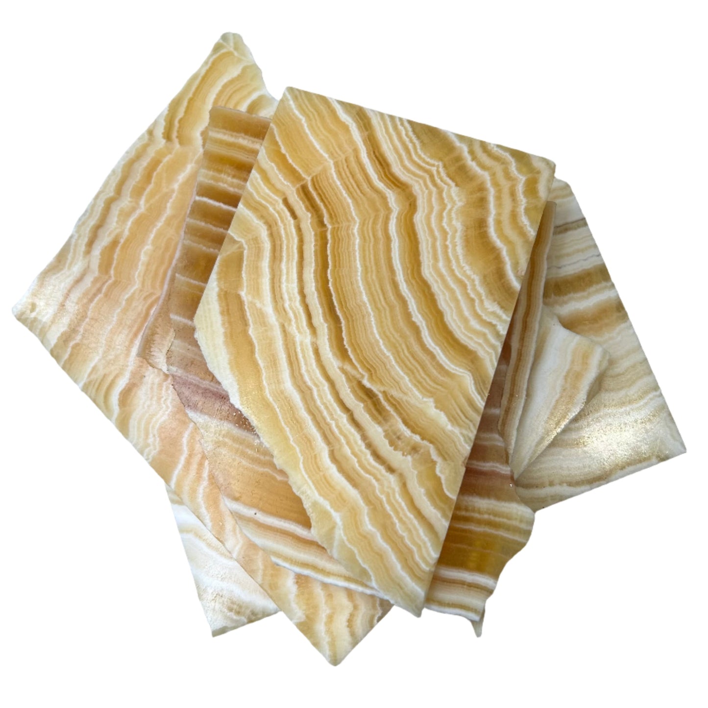 Three beautiful orange calcite slabs showcasing unique patterns and colors for healing and decorative purposes.