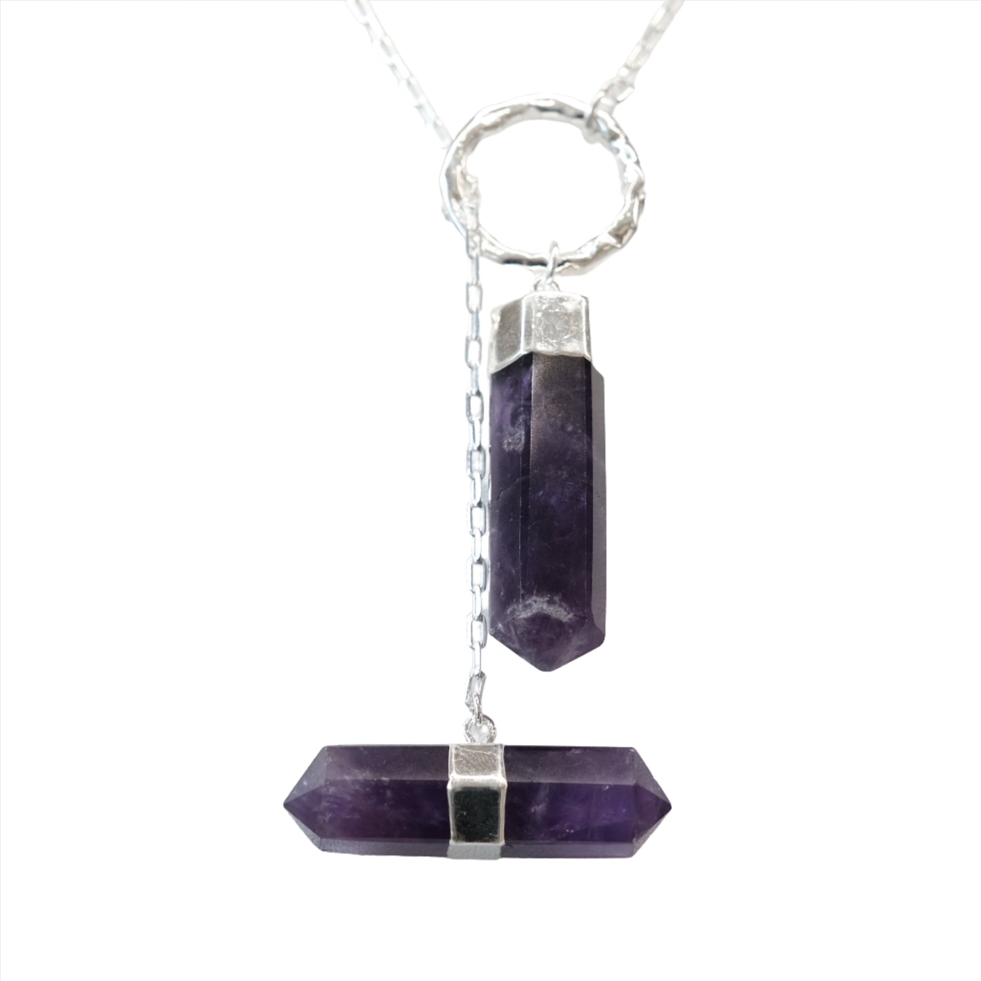 Amethyst point necklace with silver chain, promotes stress relief, mood stability, supports spirituality and physical well-being.
