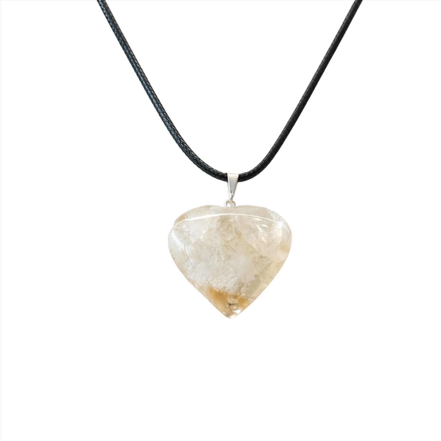 Citrine heart pendant necklace on a black cord, symbolizing energy, wealth, and self-confidence.