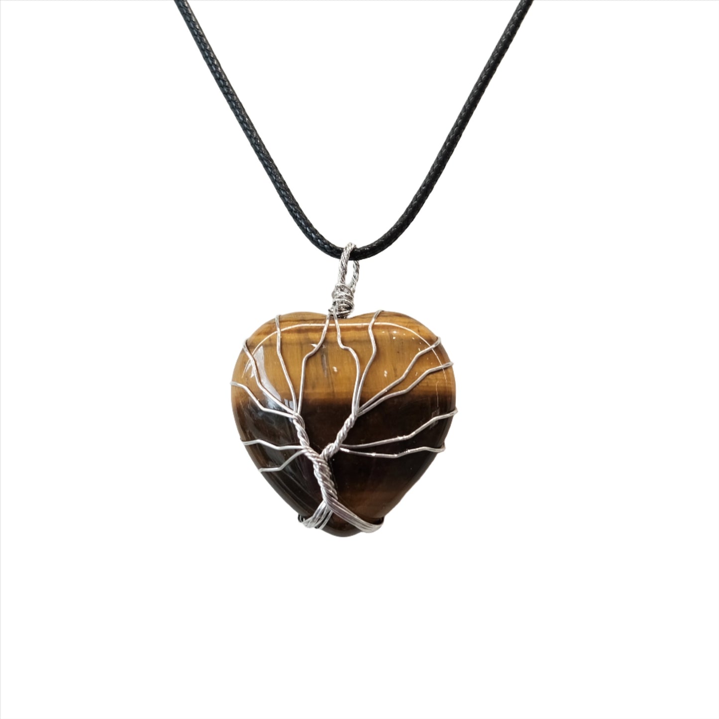 Tiger eye heart pendant necklace on black cord, promotes focus, protection, and luck, enhances willpower and courage.