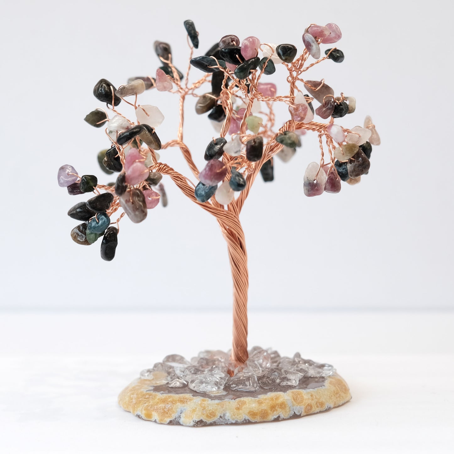Handcrafted Watermelon Tourmaline Gemstone Tree of Life with Agate Base, featuring 108 natural stones, handcrafted and unique.