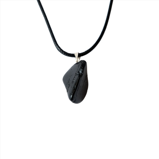 Black Tourmaline tumbled stone pendant necklace for energy protection and grounding on a black cord.