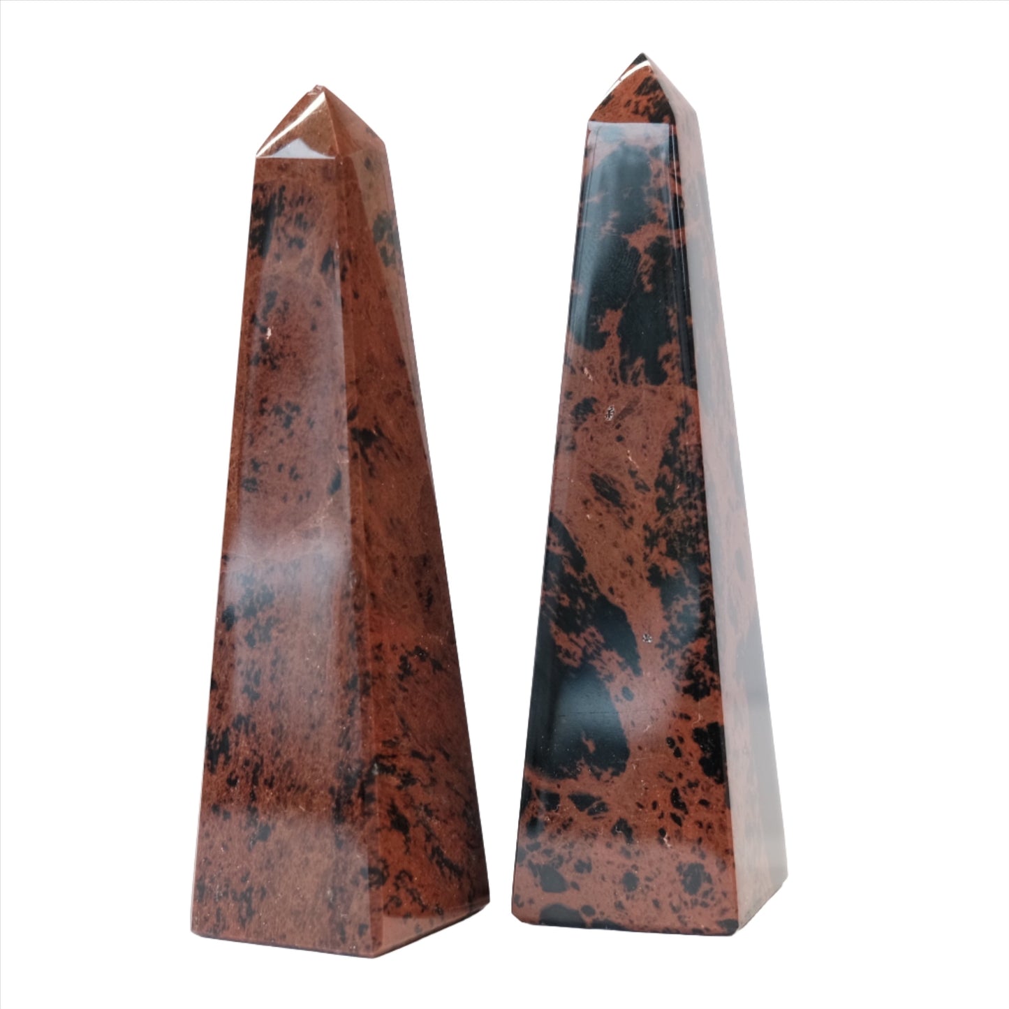 Mahogany obsidian obelisks showcasing unique textures, promoting calming energy and emotional healing for well-being.