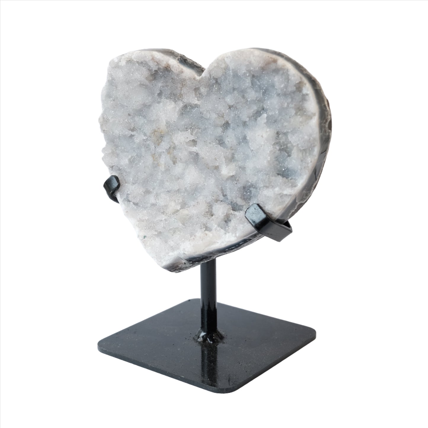 Amethyst heart-shaped crystal on stand for healing, stress relief, and mood stabilization. Perfect spiritual and wellness gift.
