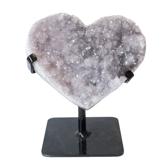 Amethyst heart-shaped healing crystal on stand, promotes stress relief, mood stabilization, and enhanced spirituality.