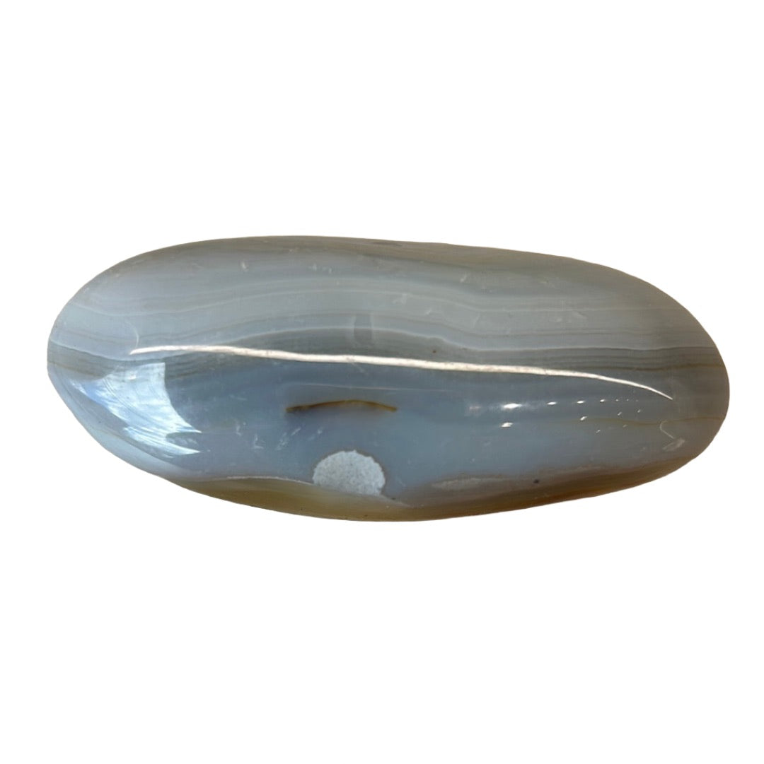 Smooth agate palm stone with translucent layers and light hues, known for its healing properties and emotional benefits.