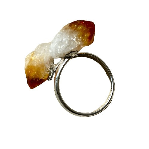 Adjustable ring featuring a natural citrine crystal known for attracting wealth and boosting self-confidence.