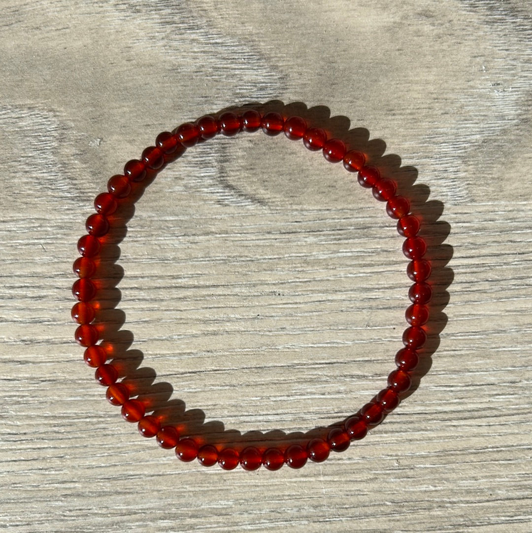 Carnelian empowerment bracelet made of 4mm genuine carnelian beads, promoting motivation and creativity.