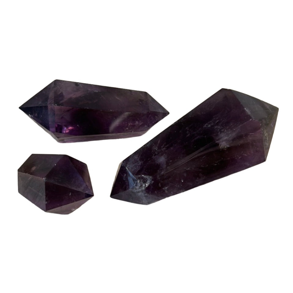 Amethyst double terminated points for stress relief and healing, enhances spirituality, boosts immune system, reduces insomnia.