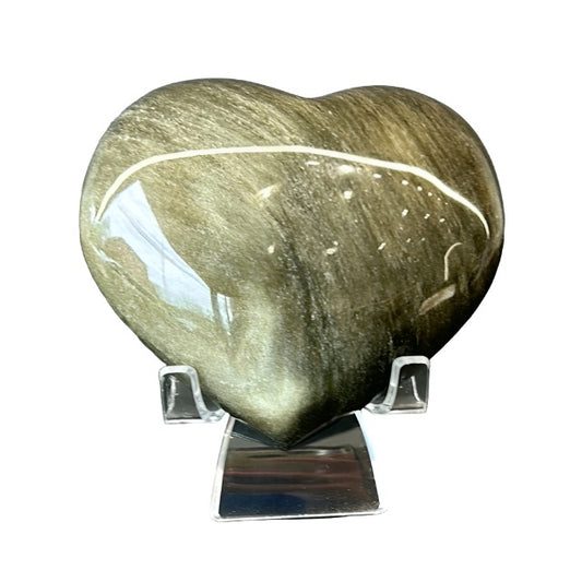 Golden sheen obsidian heart sculpture on display, showcasing its smooth surface and healing properties.