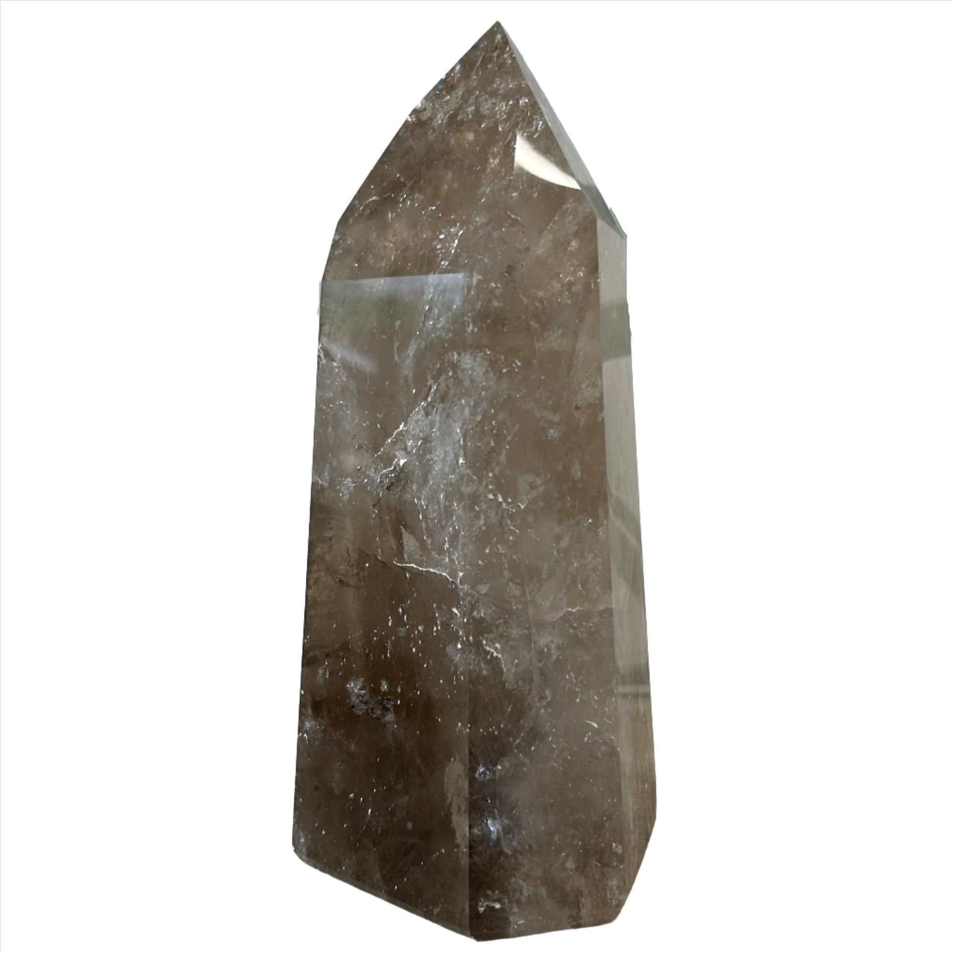 Smoky Quartz Tower 1343g, a grounding crystal that neutralizes negative energies and promotes well-being.