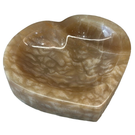 Honey Calcite heart bowl, promoting self-worth, intuition, and positive energy. Perfect for crystal enthusiasts.