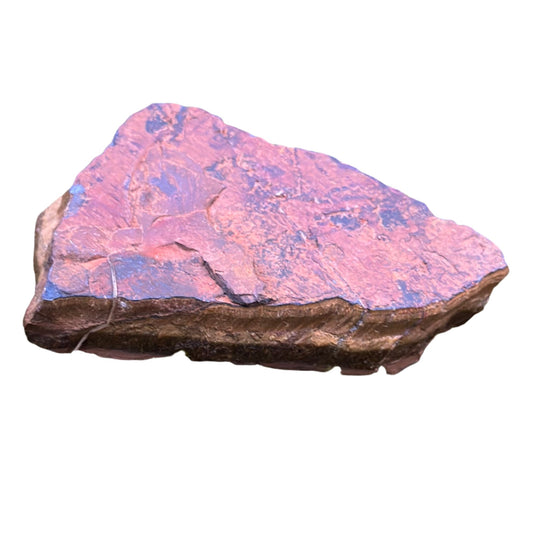 Raw Tiger Eye crystal free form, showcasing its unique texture and colors for spiritual healing and clarity.