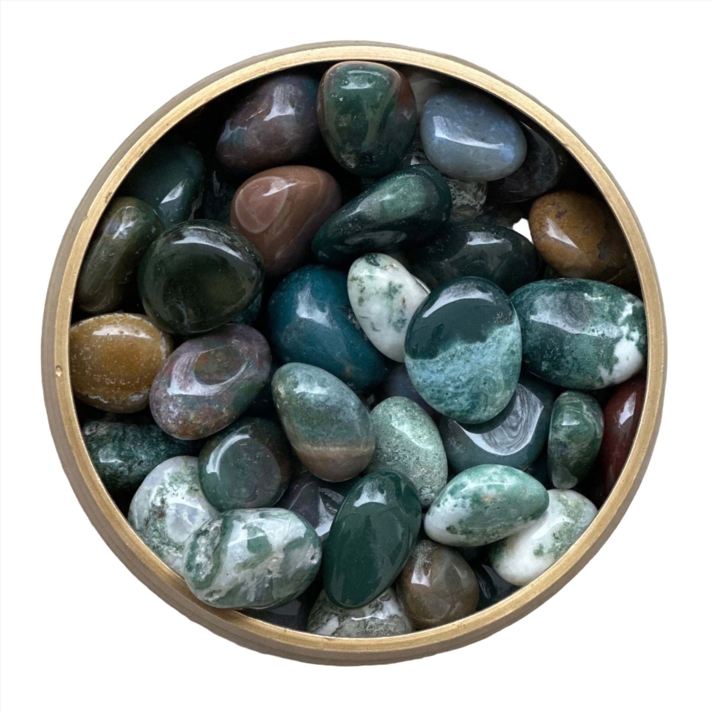 Ocean Jasper tumbled stones in a bowl, showcasing vibrant colors and smooth texture, known for healing and soothing properties.