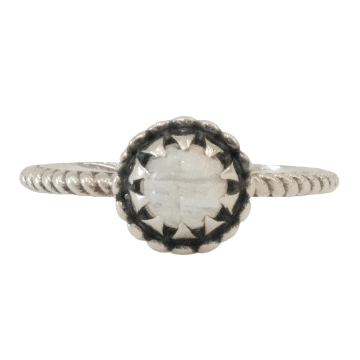 Moonstone round sterling silver ring size 7, promotes inner strength and growth, enhances intuition and creativity.