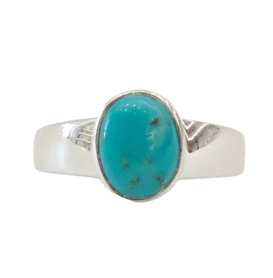Turquoise oval sterling silver ring in size 6, featuring a smooth stone setting.