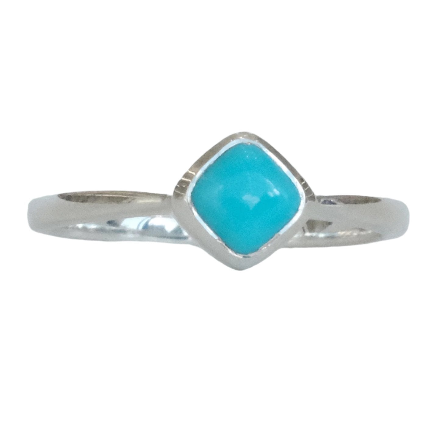 Turquoise square sterling silver ring, size 7, featuring a polished turquoise gemstone setting on a sleek band.