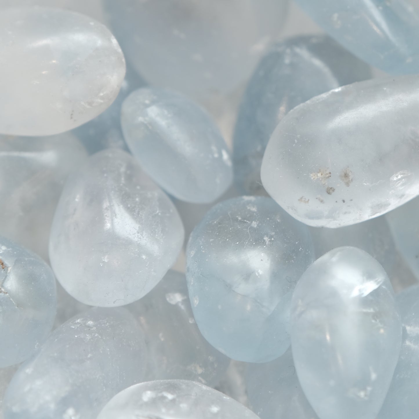 Celestite tumbled stones for meditation, stress relief, and inner peace, with calming blue hues enhancing intuition and healing energy.