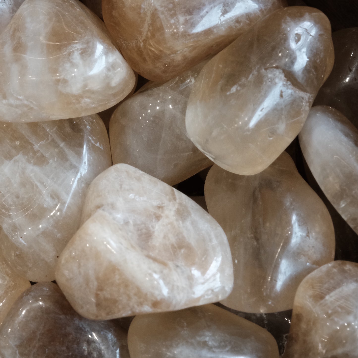 Citrine tumbled stones 30-50MM known for energizing life, enhancing intuition, and attracting wealth and prosperity.