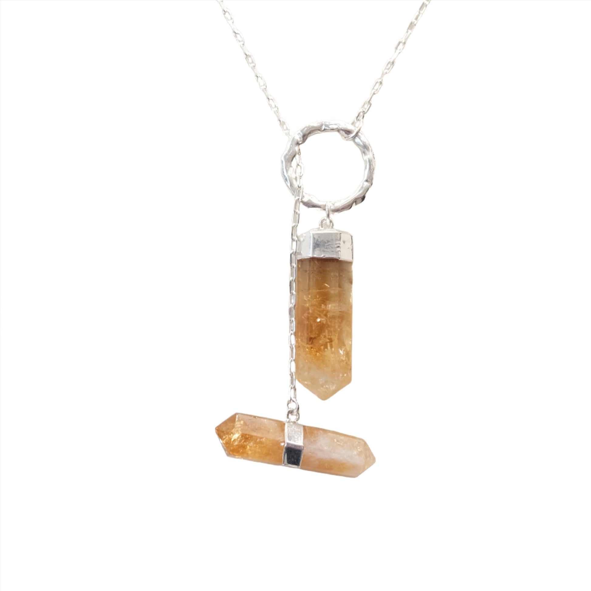 Citrine double point necklace featuring two vibrant crystals in a silver setting, symbolizing energy and prosperity.