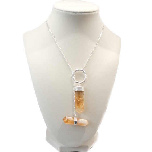 Citrine double point necklace featuring energizing crystals for wealth and intuition on a silver chain.