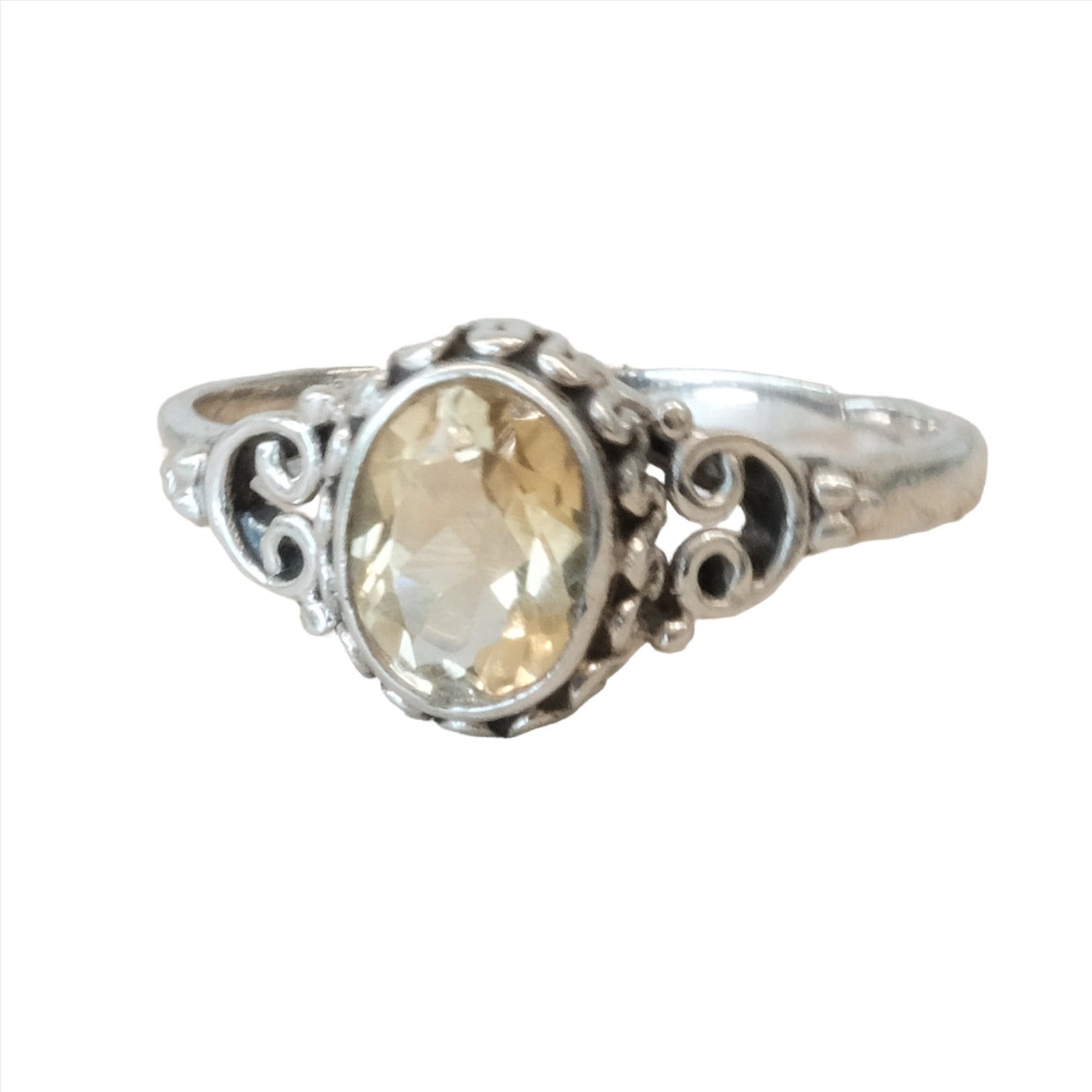 Citrine sterling silver ring size 9 featuring an elegant oval gemstone with intricate detailing.