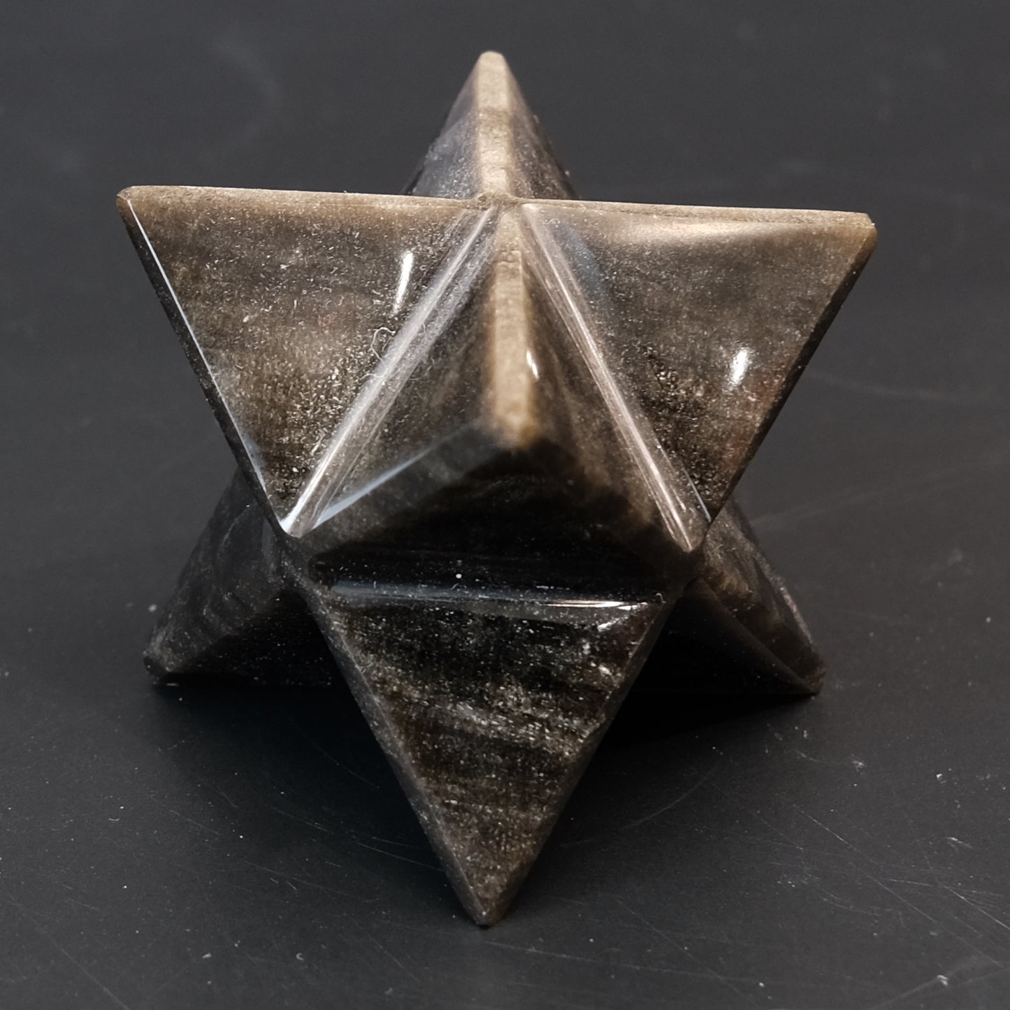 Golden Sheen Obsidian Merkaba sculpture, hexagonal star shape, showcasing its unique shine and intricate craftsmanship.