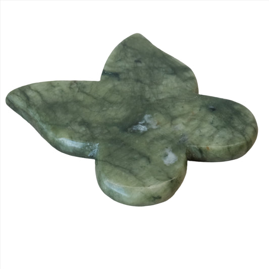 Jade butterfly gua sha stone symbolizing serenity and harmony, perfect for facial massage and skincare rituals.