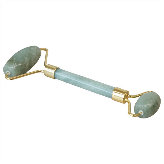 Jade double part massage roller with gold accents, promoting serenity, protection, and tranquility in skincare routines.