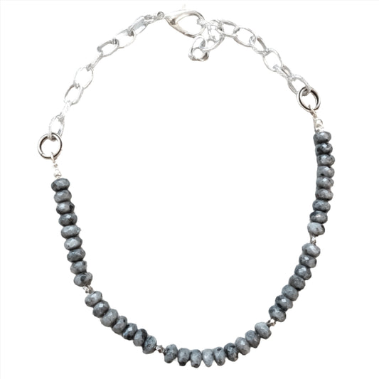 Labradorite beaded necklace with silver chain in circular design.